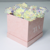 Boîte à fleurs en daim rose